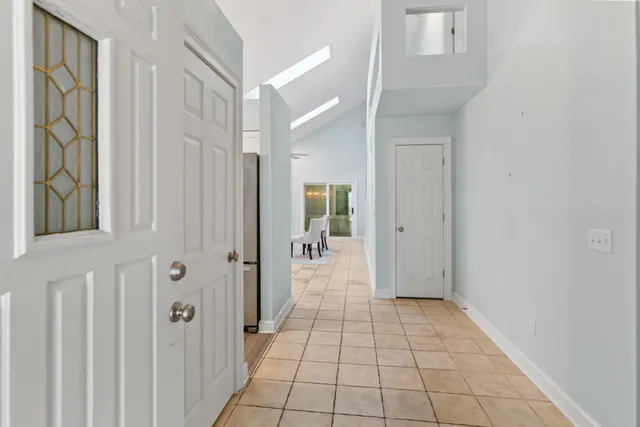 a view of a bathroom from the hallway