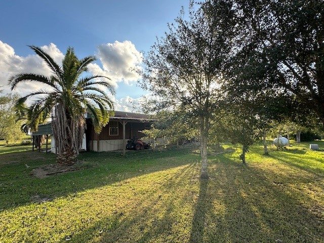 6083 Farm To Market 1462 Rosharon, TX 77583 - Photo 15 of 43 a view of a backyard with swimming pool