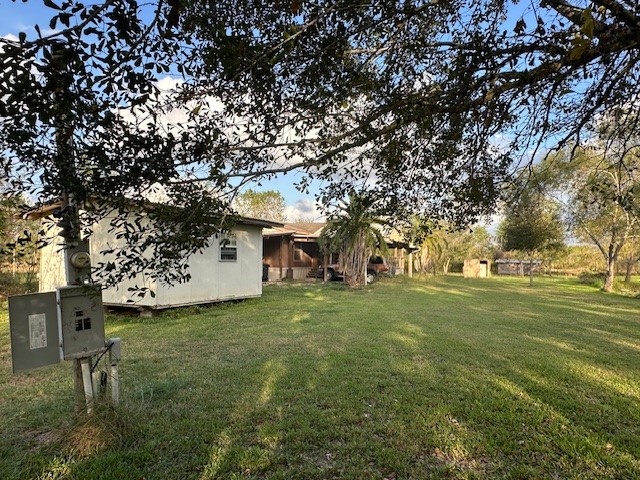 6083 Farm To Market 1462 Rosharon, TX 77583 - Photo 29 of 43 a view of a house with a yard