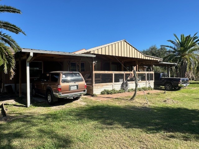 6083 Farm To Market 1462 Rosharon, TX 77583 - Photo 41 of 43 a front view of a house with garden