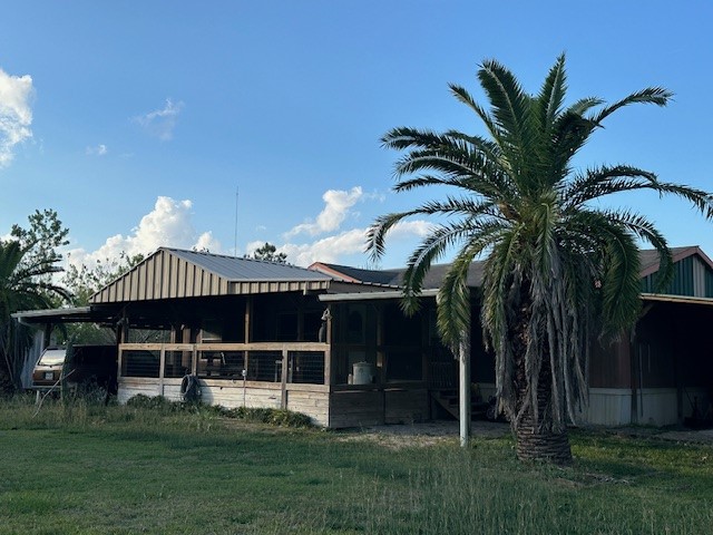 6083 Farm To Market 1462 Rosharon, TX 77583 - Photo 6 of 43 a front view of a house with a garden