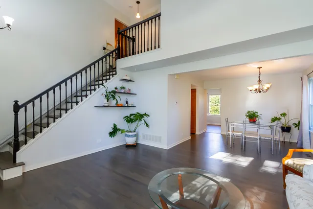 a view of entryway livingroom and hall