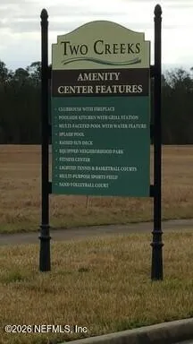 a sign on the side of the road