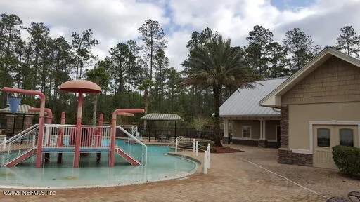 an outdoor view of house with outdoor seating