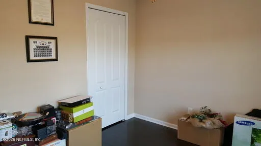 a room with toys and wooden floor