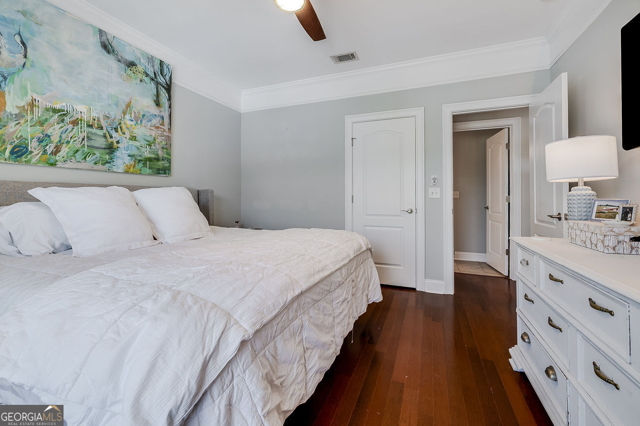 7272 Shellman Bluff Road Northeast, Unit 18 Townsend, GA 31331 - Photo 25 of 31 a bedroom with bed and window