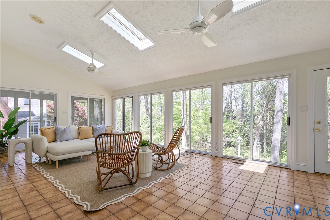 10000 Ramsbury Way Richmond, VA 23238 - Photo 14 of 59 a living room with furniture and a large window with outer view