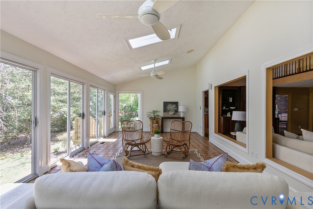 10000 Ramsbury Way Richmond, VA 23238 - Photo 17 of 59 a living room with furniture and a large window