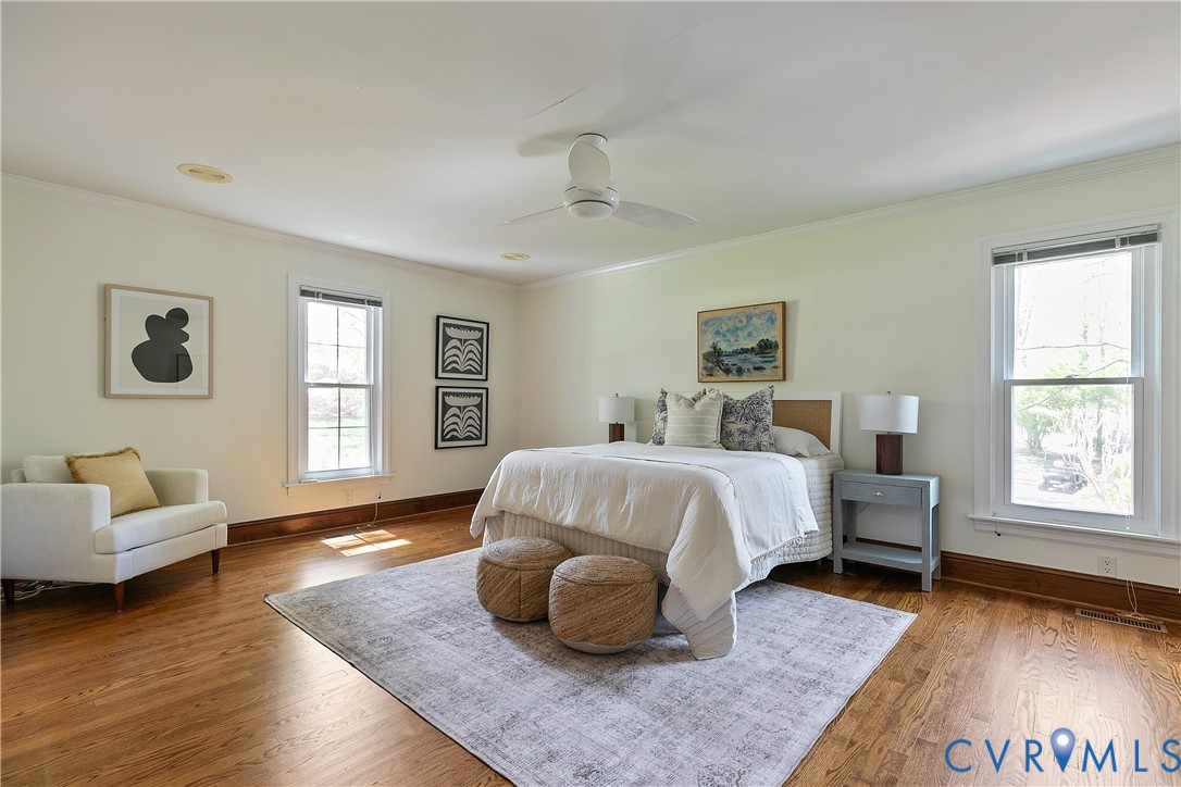 10000 Ramsbury Way Richmond, VA 23238 - Photo 31 of 59 a spacious bedroom with a bed and a couch