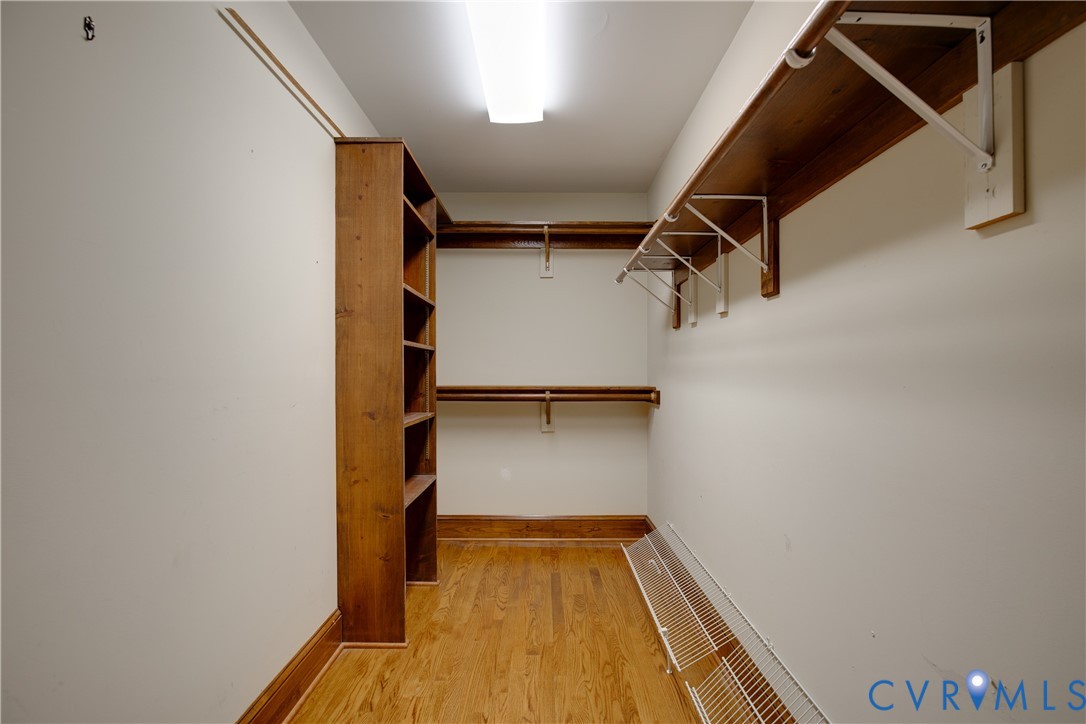 10000 Ramsbury Way Richmond, VA 23238 - Photo 35 of 59 a view of walk in closet with empty racks