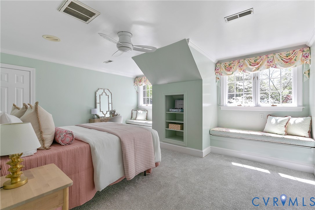 10000 Ramsbury Way Richmond, VA 23238 - Photo 38 of 59 a bedroom with a bed and a large window