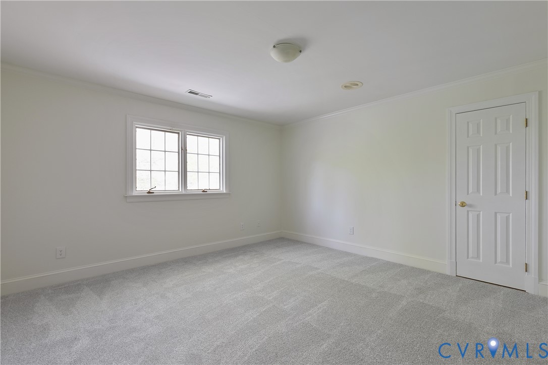 10000 Ramsbury Way Richmond, VA 23238 - Photo 47 of 59 an empty room with windows