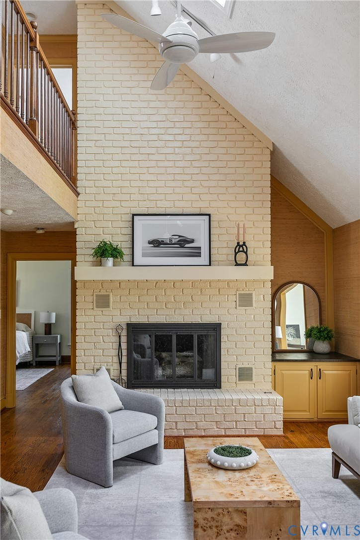 10000 Ramsbury Way Richmond, VA 23238 - Photo 6 of 59 a living room with furniture and a fireplace