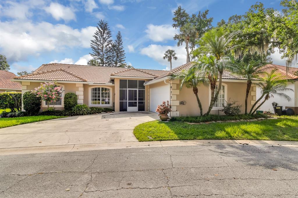 625 Nighthawk Circle Winter Springs, FL 32708 - Photo 36 of 36 a view of house with a yard and potted plants