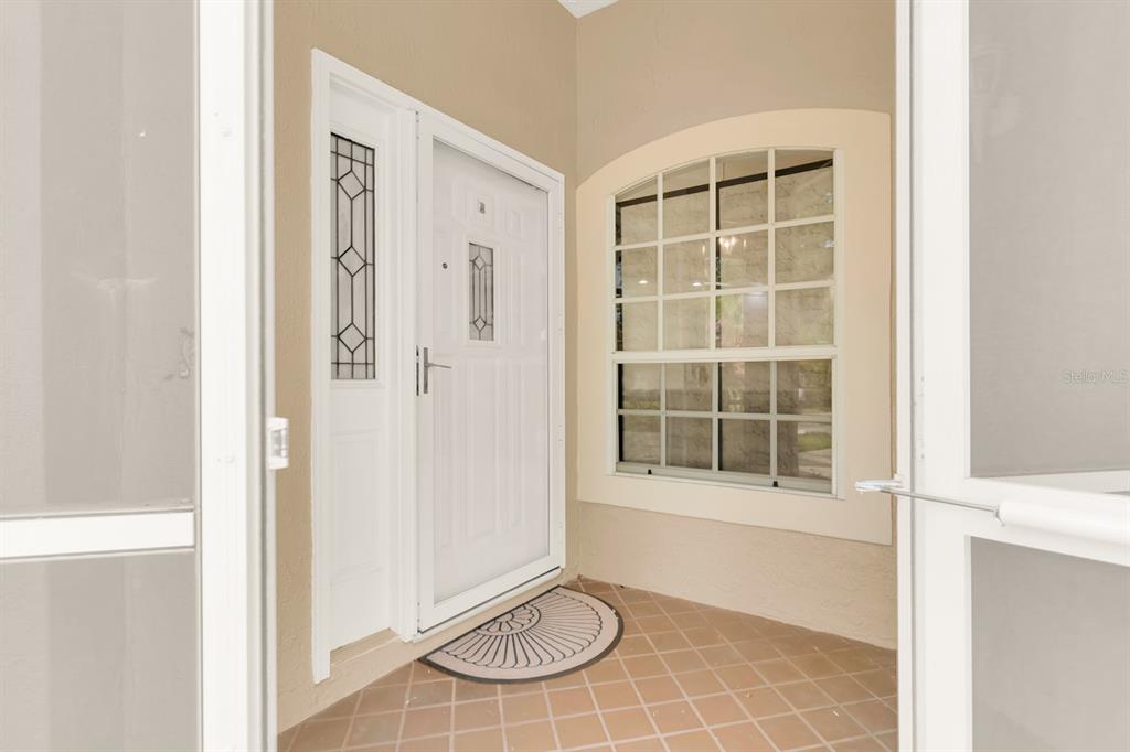 625 Nighthawk Circle Winter Springs, FL 32708 - Photo 4 of 36 a view of a livingroom with wooden floor and a window