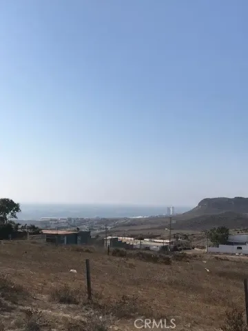 an aerial view of beach and city