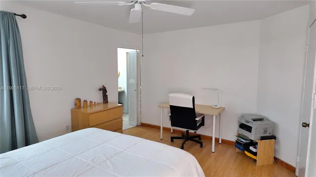 a bathroom with a sink a mirror and a bathtub