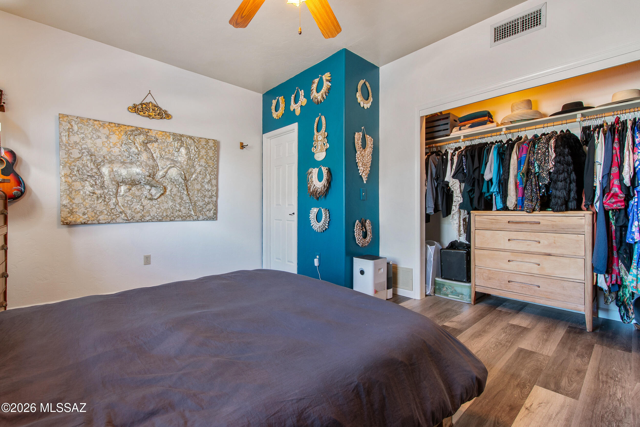 4155 West Coyote Ridge Trail Tucson, AZ 85746 - Photo 29 of 39 a bedroom with a bed and closet