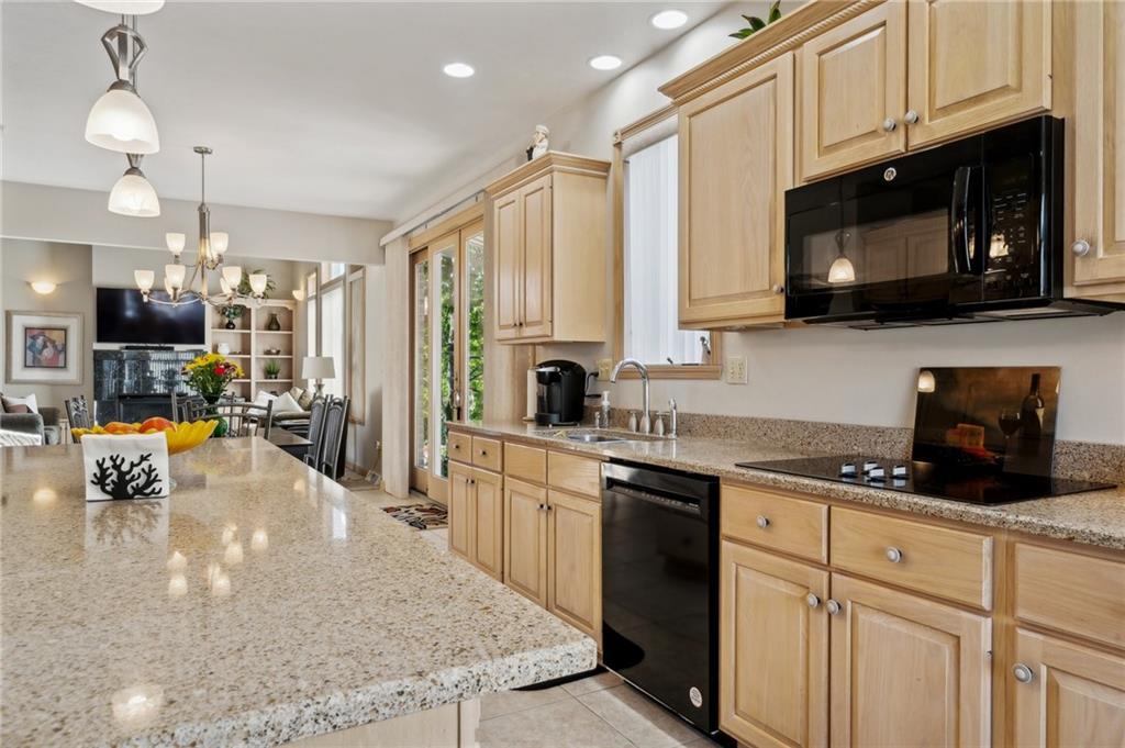 339 Kathy Drive Belle Vernon, PA 15012 - Photo 14 of 48 a kitchen with stainless steel appliances granite countertop a sink a stove and cabinets
