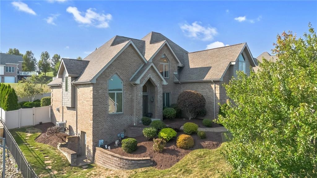 339 Kathy Drive Belle Vernon, PA 15012 - Photo 2 of 48 a front view of a house with a yard