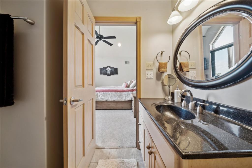 339 Kathy Drive Belle Vernon, PA 15012 - Photo 27 of 48 a bathroom with a granite countertop sink and a mirror