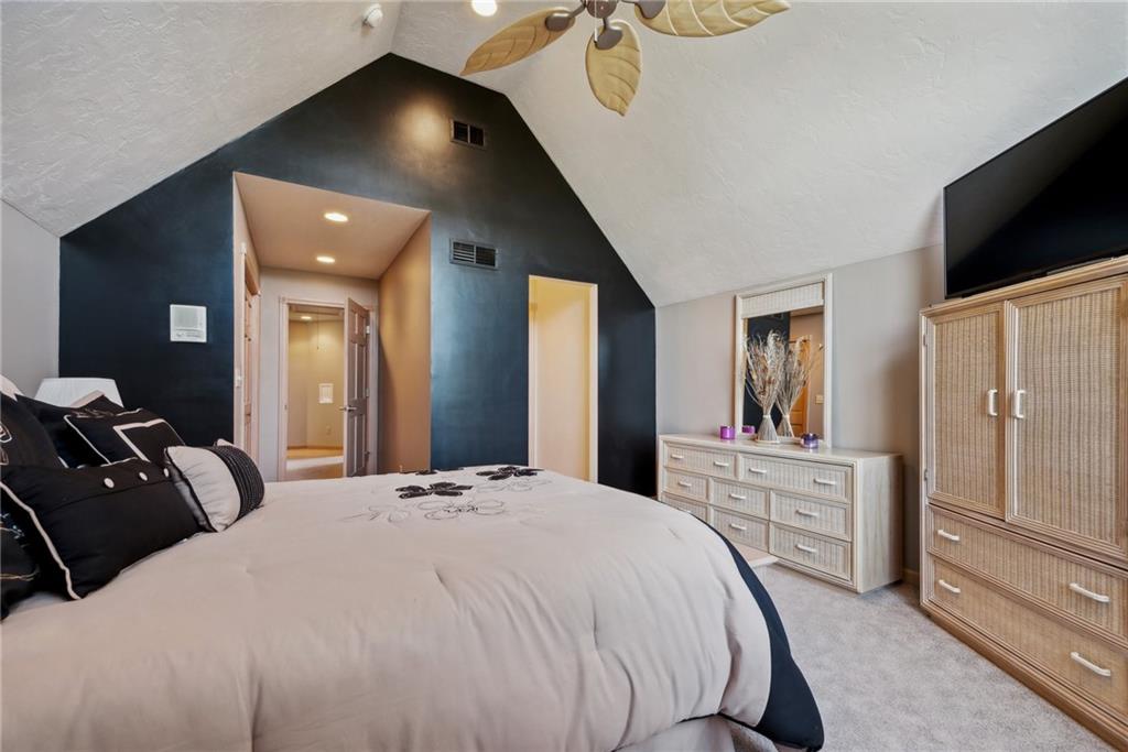 339 Kathy Drive Belle Vernon, PA 15012 - Photo 28 of 48 a bedroom with a bed and a flat screen tv