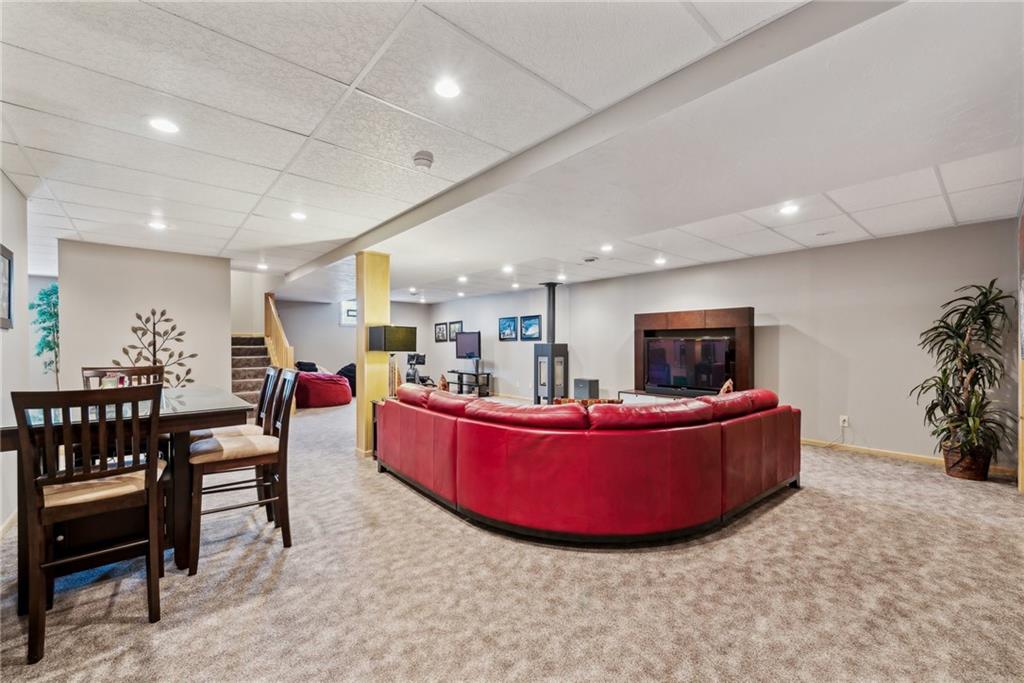 339 Kathy Drive Belle Vernon, PA 15012 - Photo 32 of 48 a living room with furniture and a flat screen tv