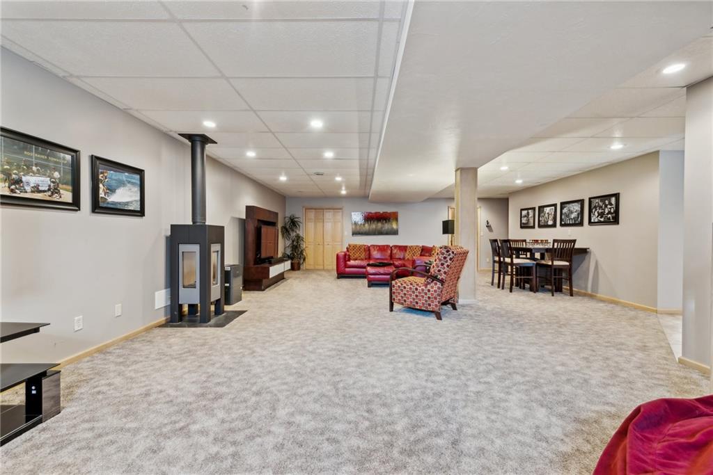 339 Kathy Drive Belle Vernon, PA 15012 - Photo 33 of 48 a living room with furniture and a flat screen tv