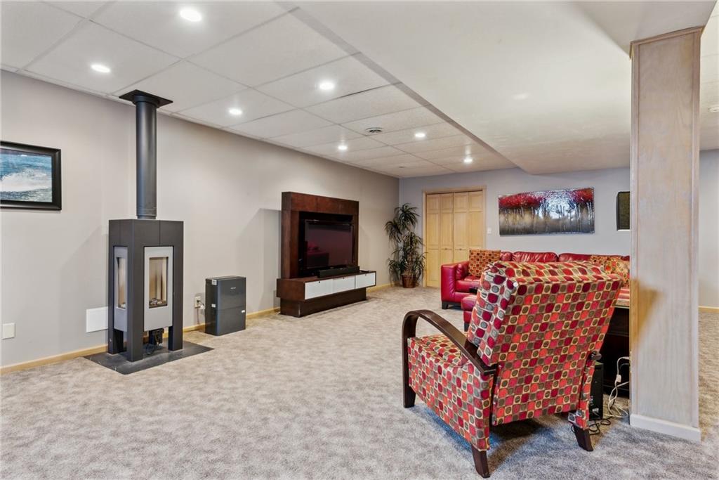 339 Kathy Drive Belle Vernon, PA 15012 - Photo 35 of 48 a living room with furniture and a flat screen tv