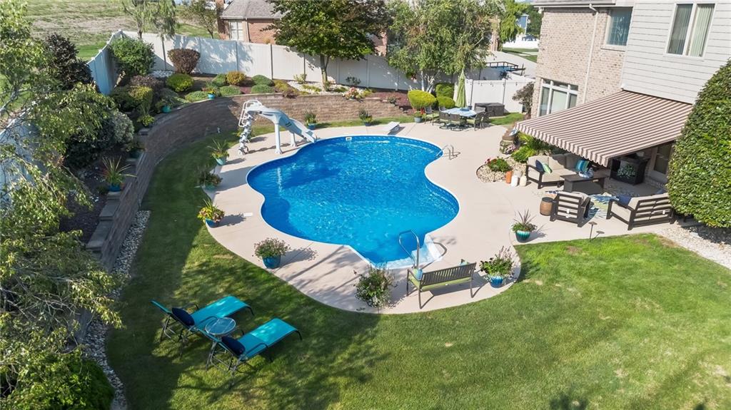 339 Kathy Drive Belle Vernon, PA 15012 - Photo 41 of 48 a view of a swimming pool with sitting area