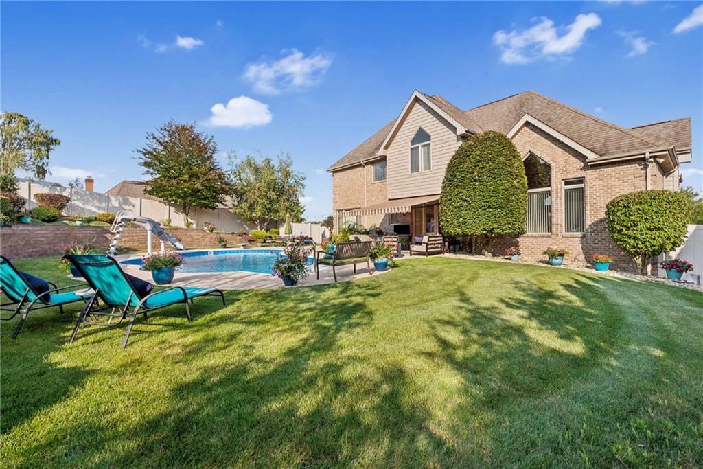 339 Kathy Drive Belle Vernon, PA 15012 - Photo 43 of 48 a view of an house with backyard space and patio