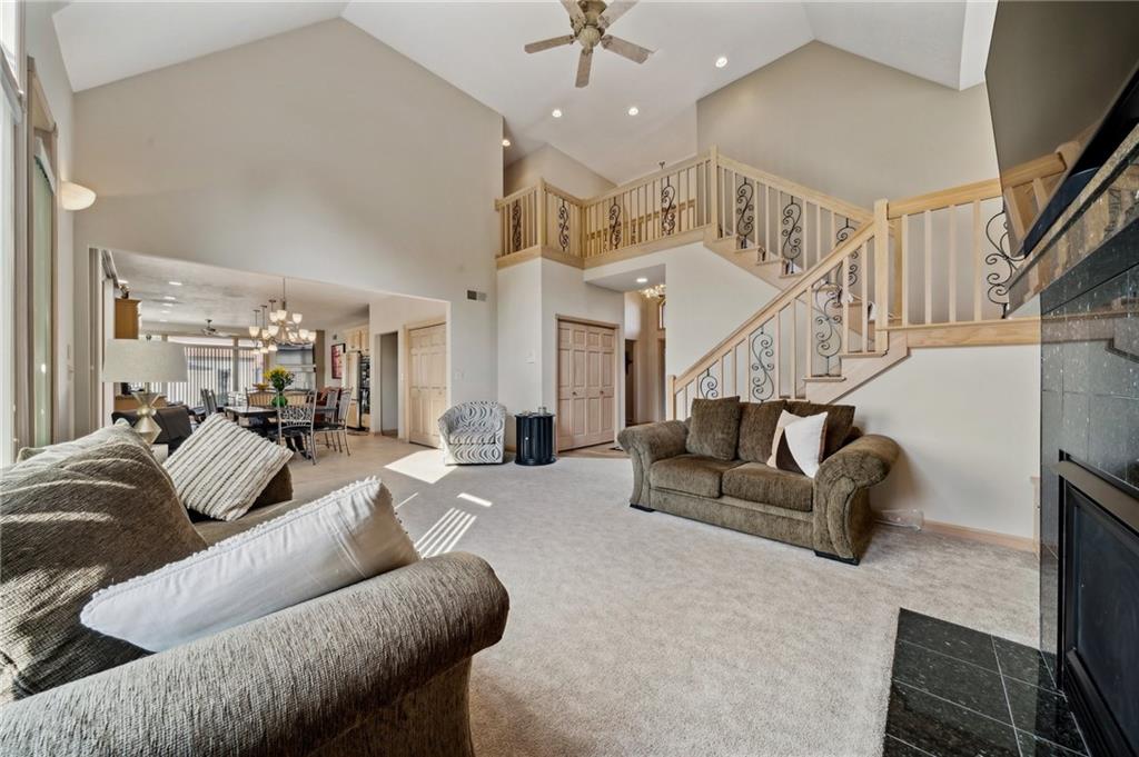 339 Kathy Drive Belle Vernon, PA 15012 - Photo 10 of 48 a living room with furniture and a chandelier