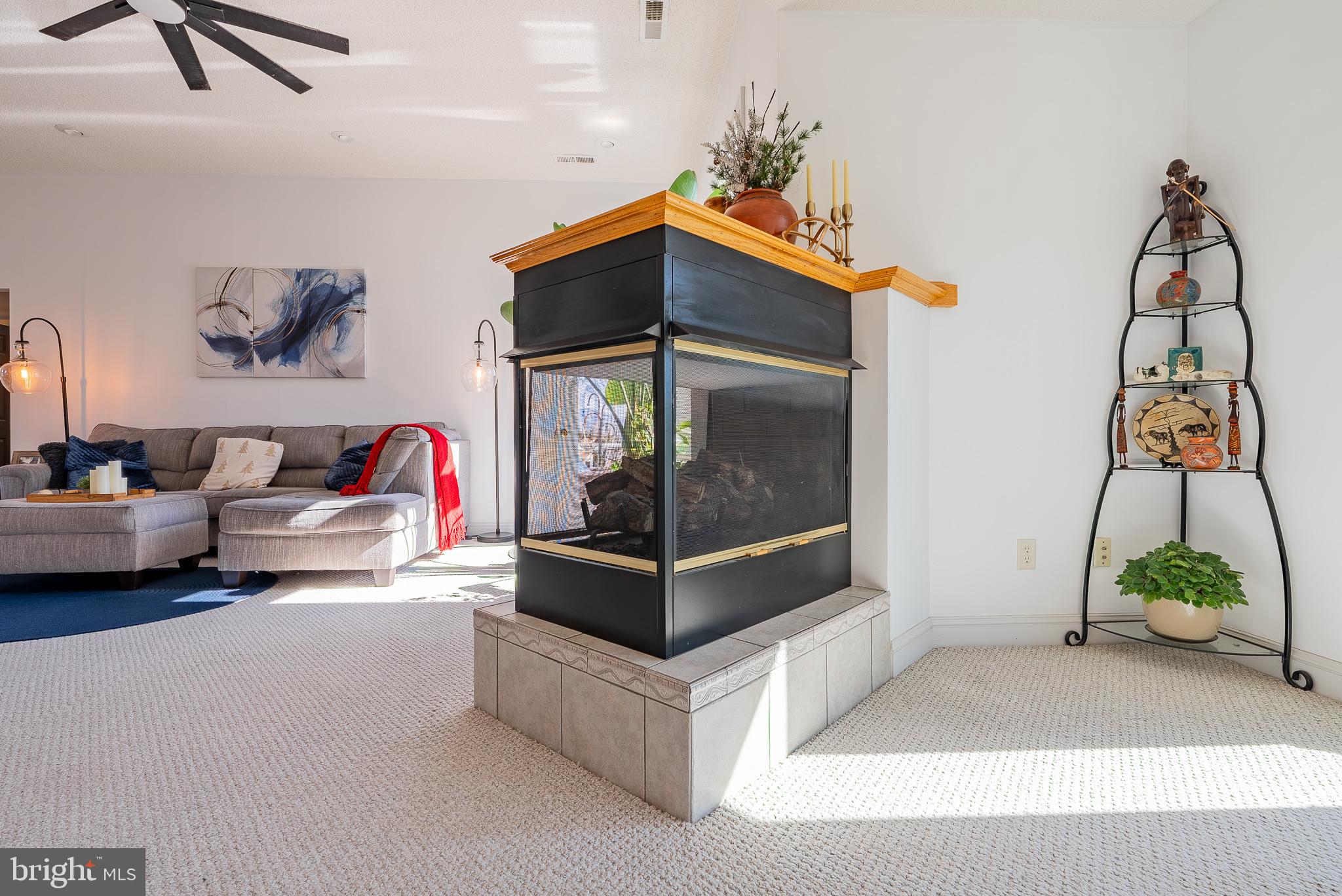 3741 Davis Road Penn Laird, VA 22846 - Photo 16 of 93 a living room with furniture and a chandelier