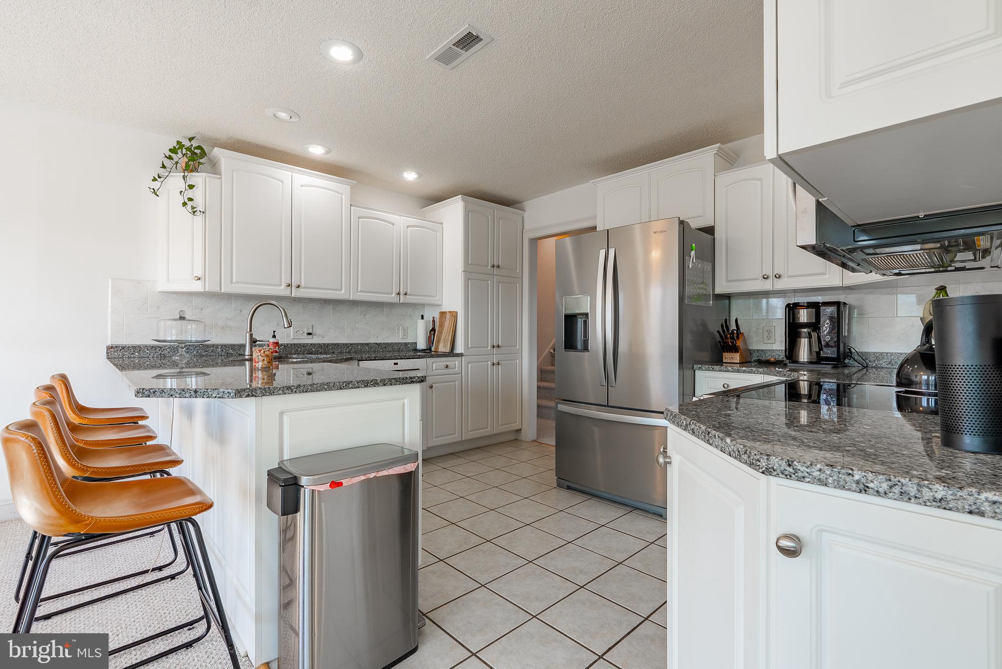 3741 Davis Road Penn Laird, VA 22846 - Photo 20 of 93 a kitchen with stainless steel appliances granite countertop a sink refrigerator and cabinets