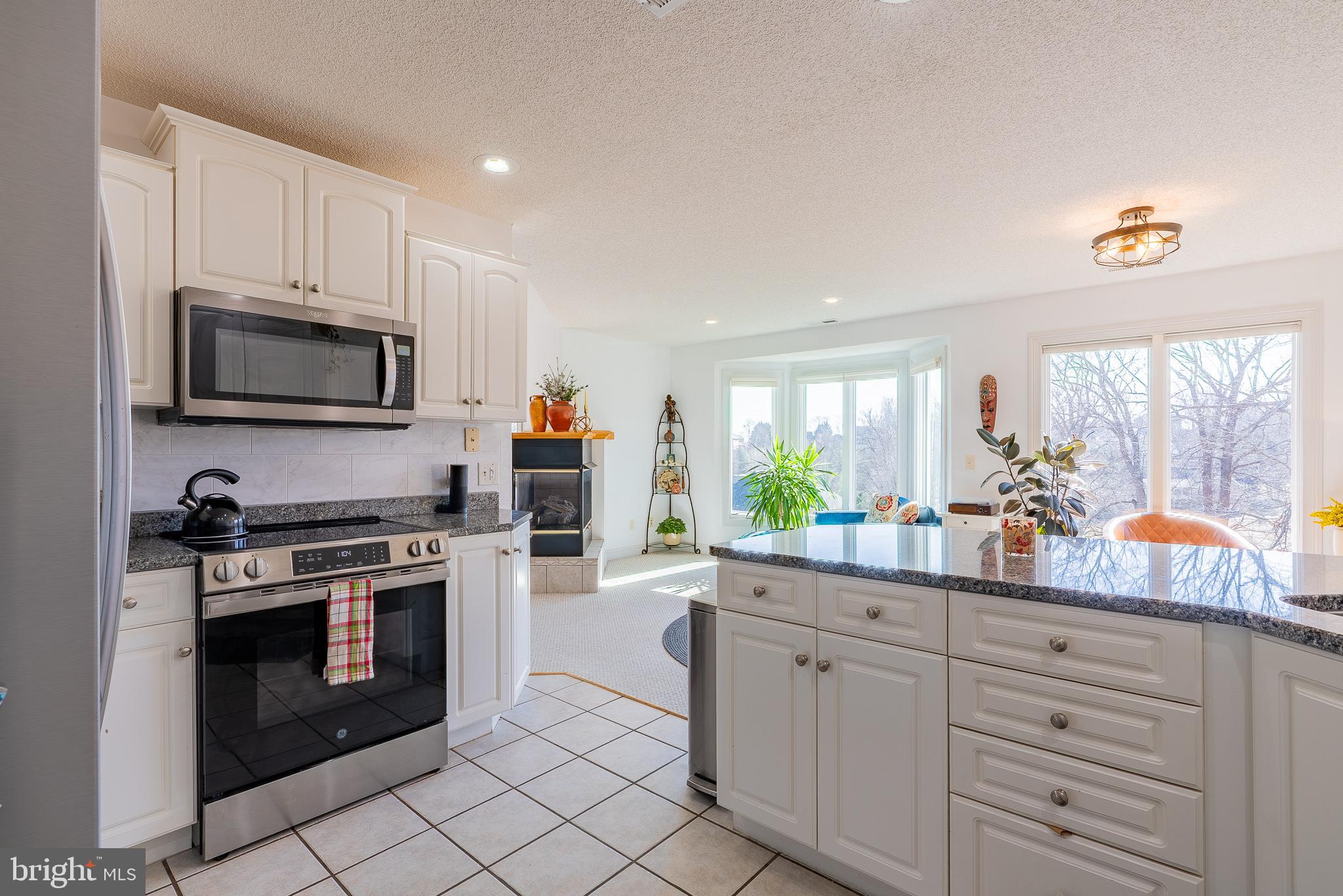 3741 Davis Road Penn Laird, VA 22846 - Photo 23 of 93 a kitchen with white cabinets and appliances