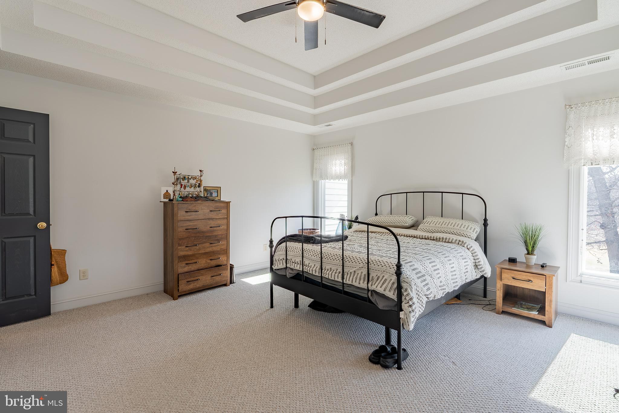 3741 Davis Road Penn Laird, VA 22846 - Photo 29 of 93 a bedroom with a bed and a chandelier