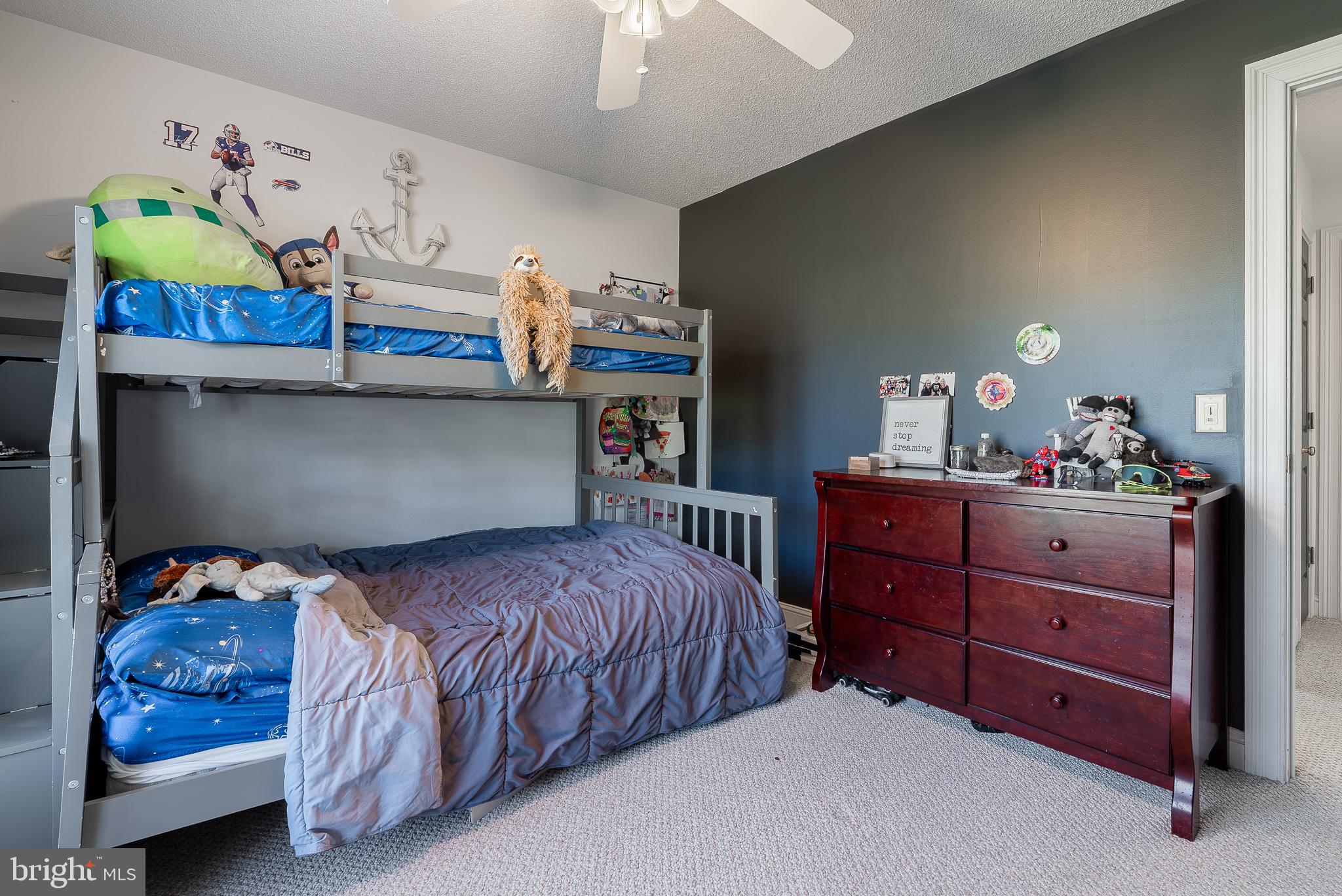 3741 Davis Road Penn Laird, VA 22846 - Photo 46 of 93 a bedroom with a bed and a chandelier