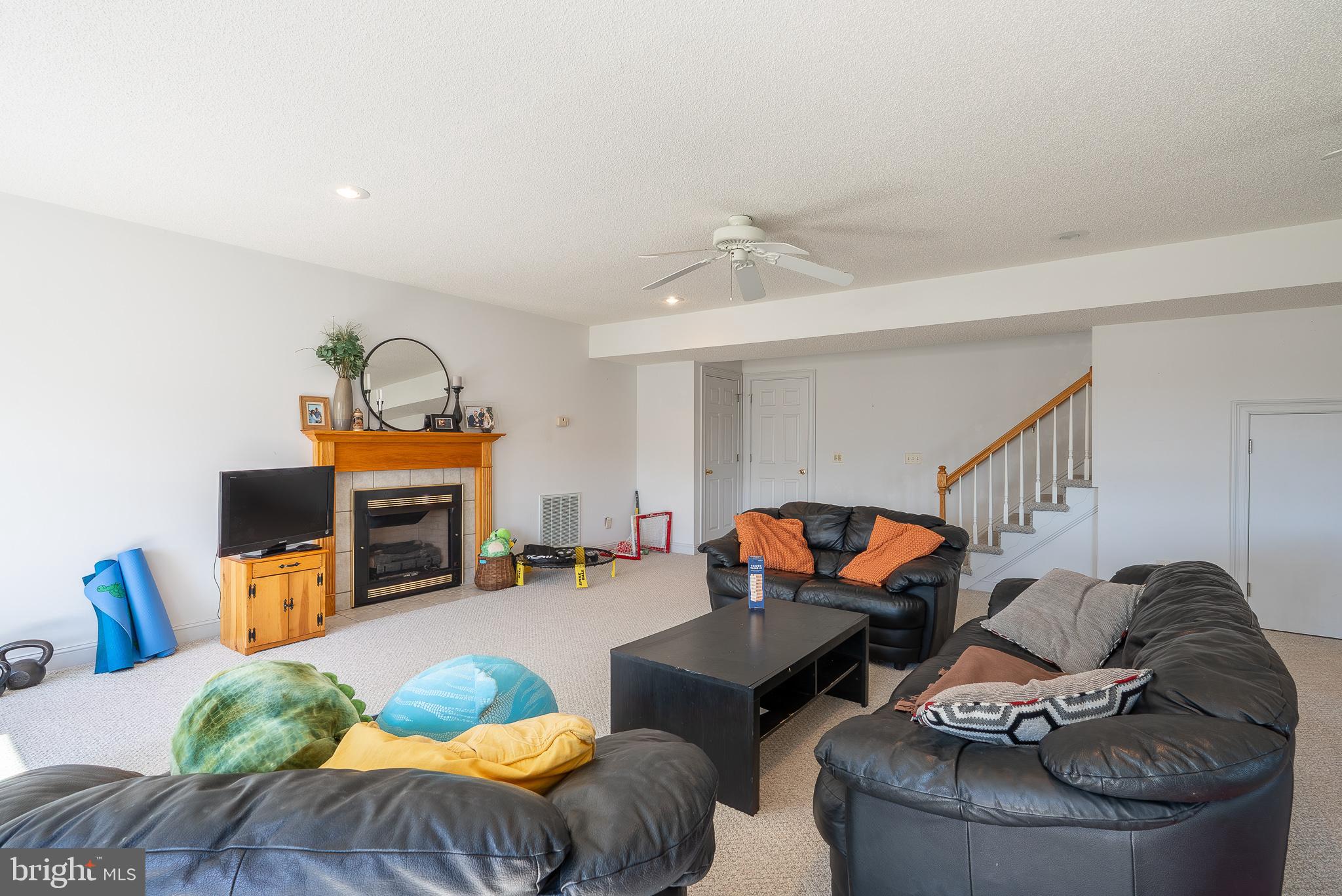 3741 Davis Road Penn Laird, VA 22846 - Photo 54 of 93 a living room with furniture fireplace and a flat screen tv