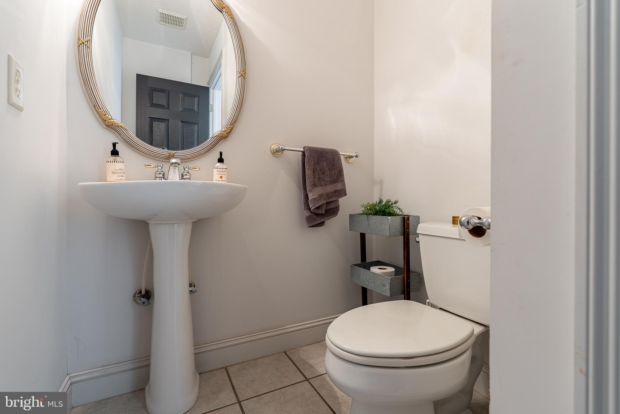 3741 Davis Road Penn Laird, VA 22846 - Photo 61 of 93 a bathroom with a toilet sink and mirror