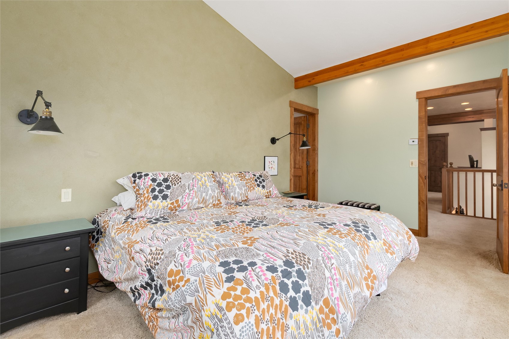 592 Ponderosa Road Fairplay, CO 80440 - Photo 24 of 45 a bedroom with a bed and a mirror