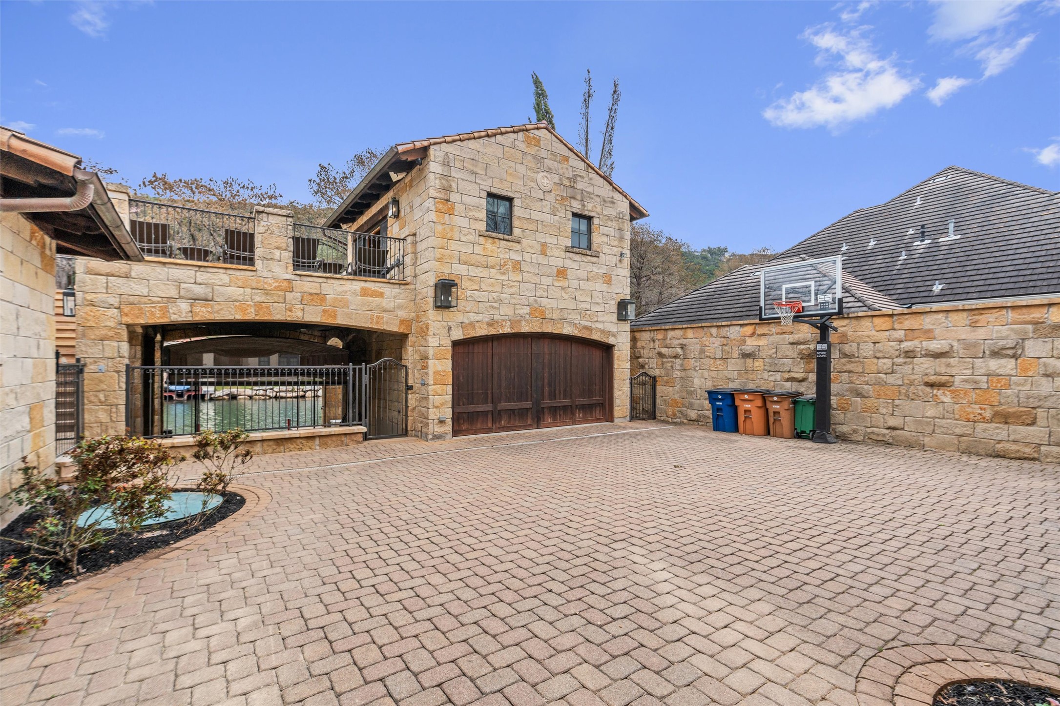 4407 Island Cove Austin, TX 78731 - Photo 38 of 40 Looking toward the water at the back garage with casita above