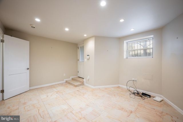 a car parked in front of a building