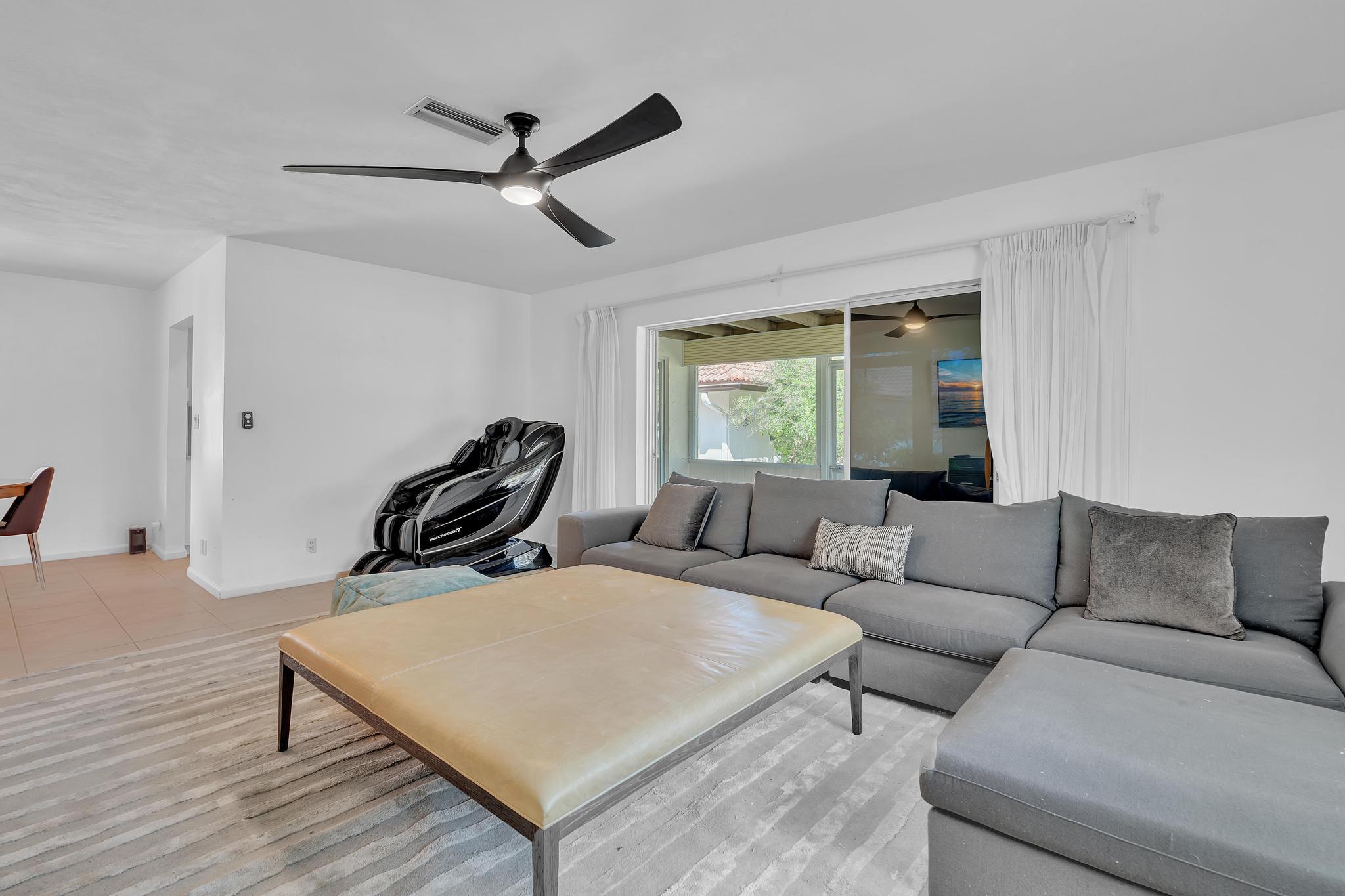 313 Northwest 42nd Street Boca Raton, FL 33431 - Photo 17 of 42 a living room with furniture