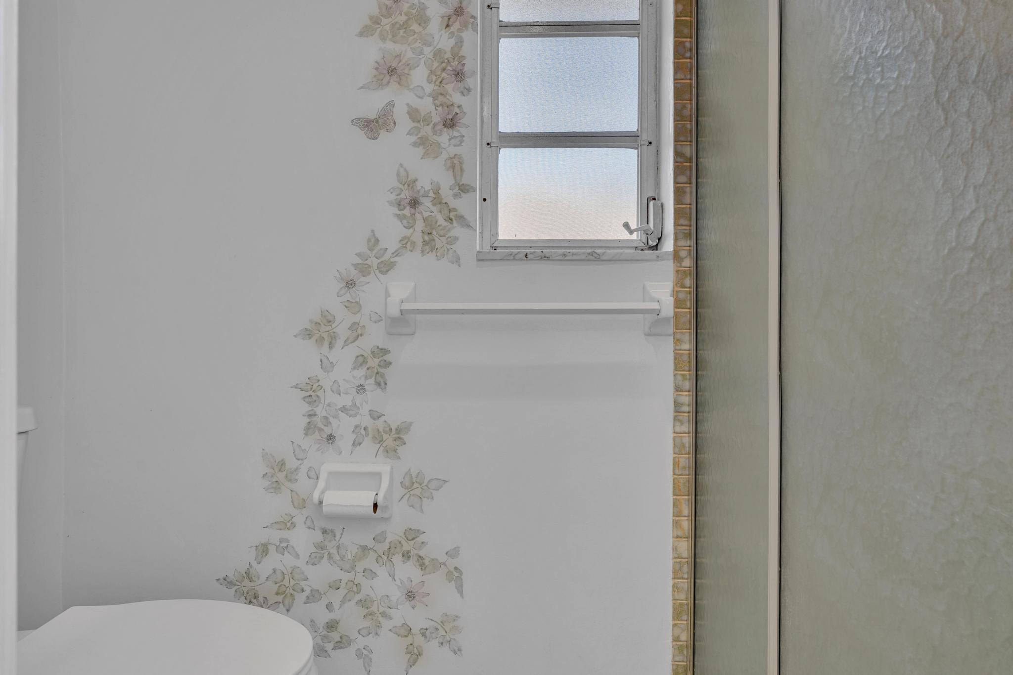 313 Northwest 42nd Street Boca Raton, FL 33431 - Photo 25 of 42 a bathroom with a toilet and a shower