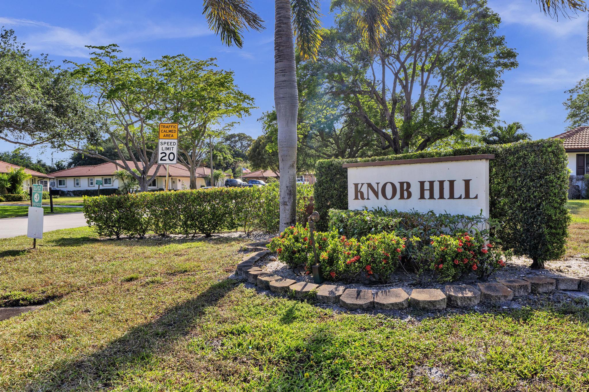 313 Northwest 42nd Street Boca Raton, FL 33431 - Photo 36 of 42 a view of sign board and green space