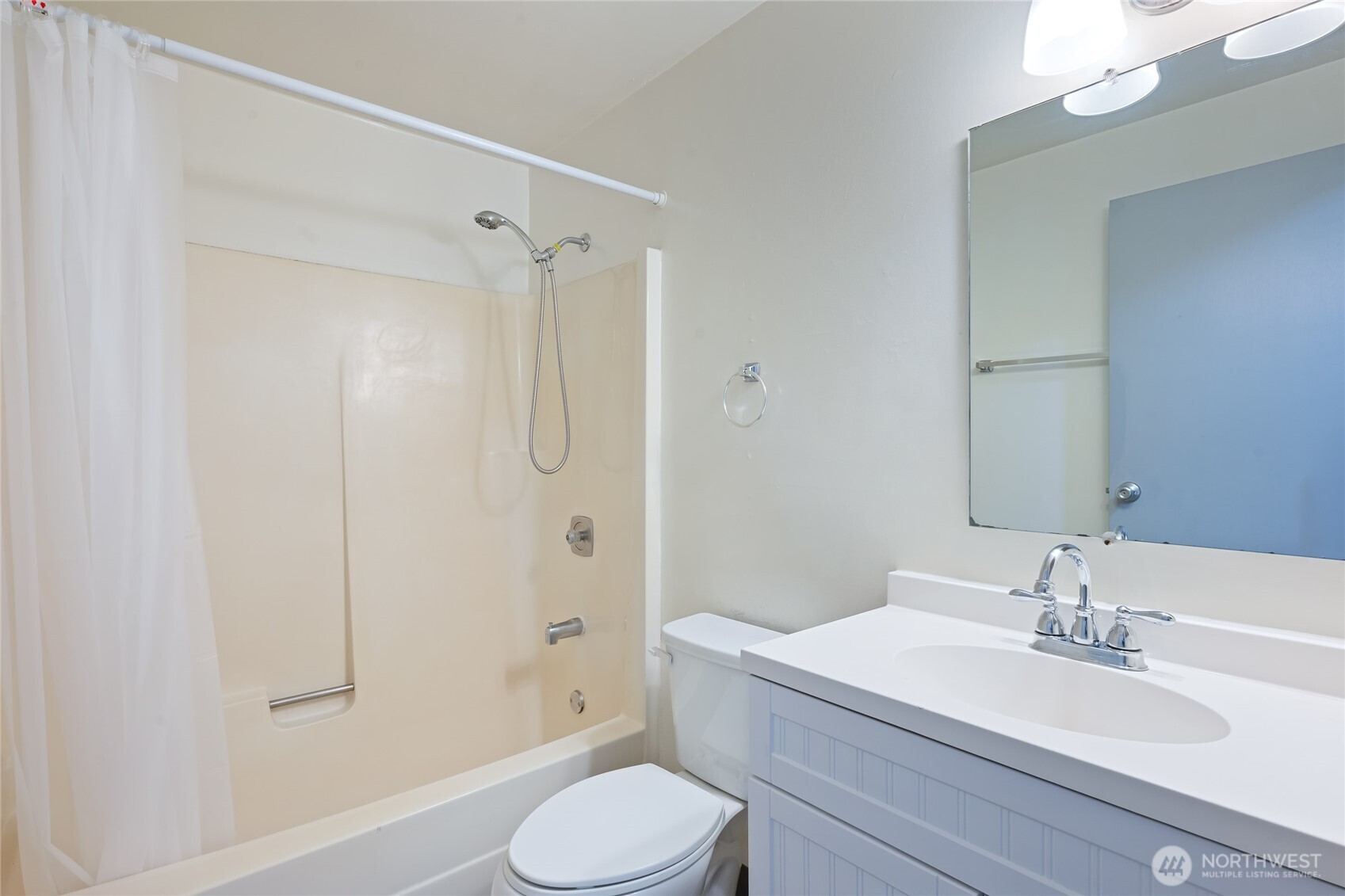 441-445 Smithers Avenue South Renton, WA 98057 - Photo 16 of 16 a bathroom with a granite countertop sink toilet and shower