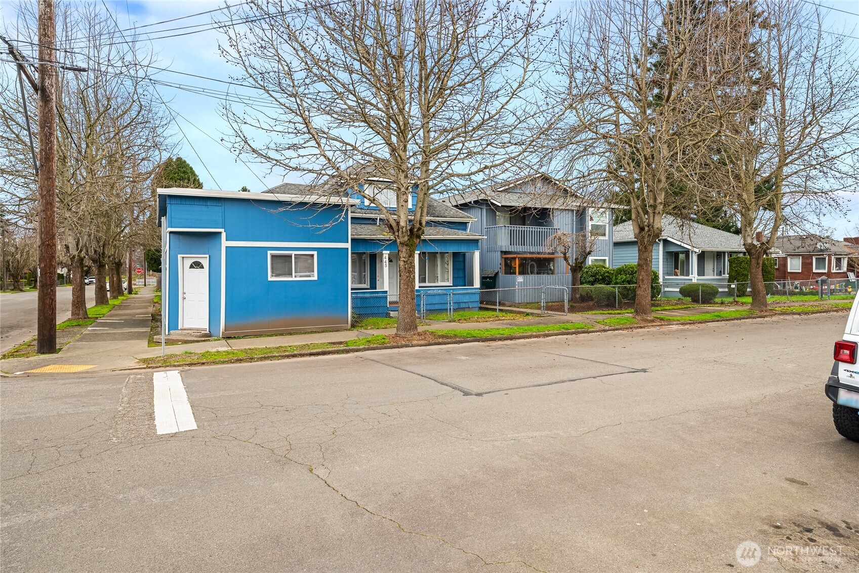 441-445 Smithers Avenue South Renton, WA 98057 - Photo 3 of 16 a view of a white house with a swimming pool