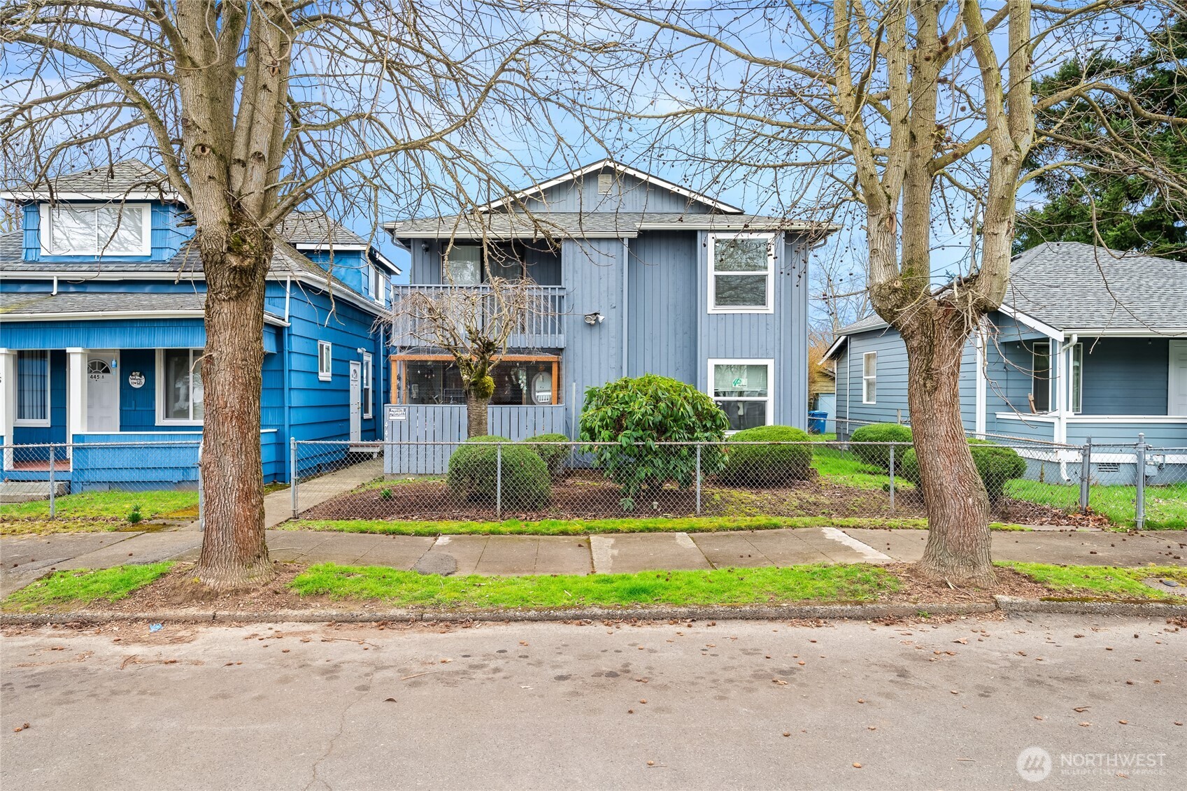 441-445 Smithers Avenue South Renton, WA 98057 - Photo 4 of 16 a front view of a house with a yard table and chairs