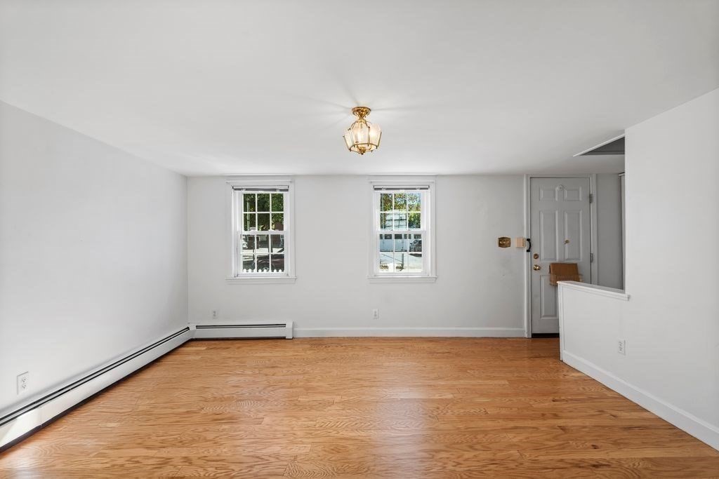 41 Durham Street Lawrence, MA 01843 - Photo 13 of 28 an empty room with a window