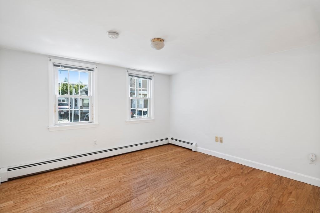 41 Durham Street Lawrence, MA 01843 - Photo 16 of 28 an empty room with a window